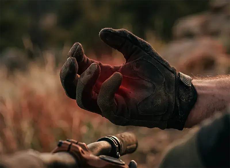 Mountain biker grip strength loss - roost bike - roost bike A mountain bikers hand with fingers locked in a death-grip from gripping the handlebar too hard for too long illustrating hand pain from grip strength loss